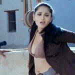 Anushka shetty hot cleavage navel and thighs in top bra suite open and mini skirt and sexy expressions HD pics starlust 34 scaled