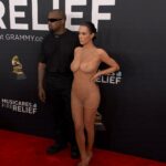 bianca censori nude showing boops and pussy in fully transparant cloth at grammy awards 2025 starlust 11