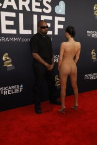 bianca censori nude showing boops and pussy in fully transparant cloth at grammy awards 2025 starlust 19