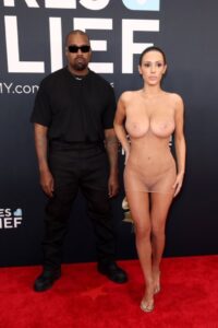 bianca censori nude showing boops and pussy in fully transparant cloth at grammy awards 2025 starlust 3