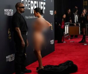 bianca censori nude showing boops and pussy in fully transparant cloth at grammy awards 2025 starlust 6