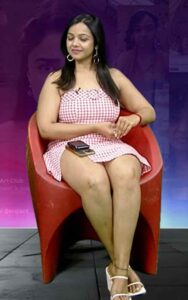 nithya shetty big thick thighs show in mini skirt @ viral prapancham movie interview starlust (30)