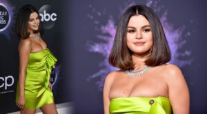 selena gomez hot big cleavage and thighs show in green bodycon
