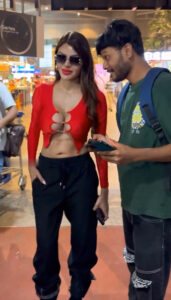 sherlyn chopra big boops show in street in red shirt starlust