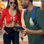 sherlyn chopra big boops show in street in red shirt starlust (4)