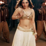 Tamanna bhatia hot navel cleavage thighs and armpits images from raid2 nasah item song starlust (2)