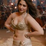 Tamanna bhatia hot navel cleavage thighs and armpits images from raid2 nasah item song starlust (27)