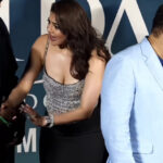 kajal_agarwal_bending_and_showing_cleavage_at_sicendar_movie_event_HD (1)